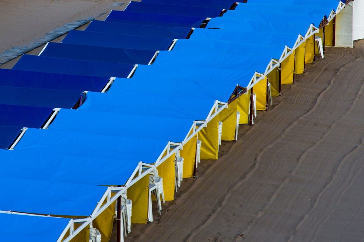 A beach cabana shelter on the shoreline